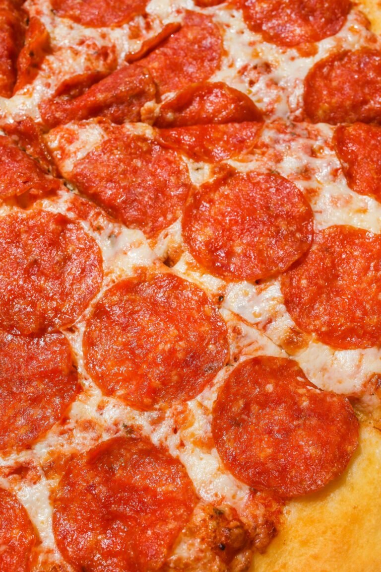 Mouth-watering pepperoni pizza with melted cheese and golden crust, perfect for any meal.