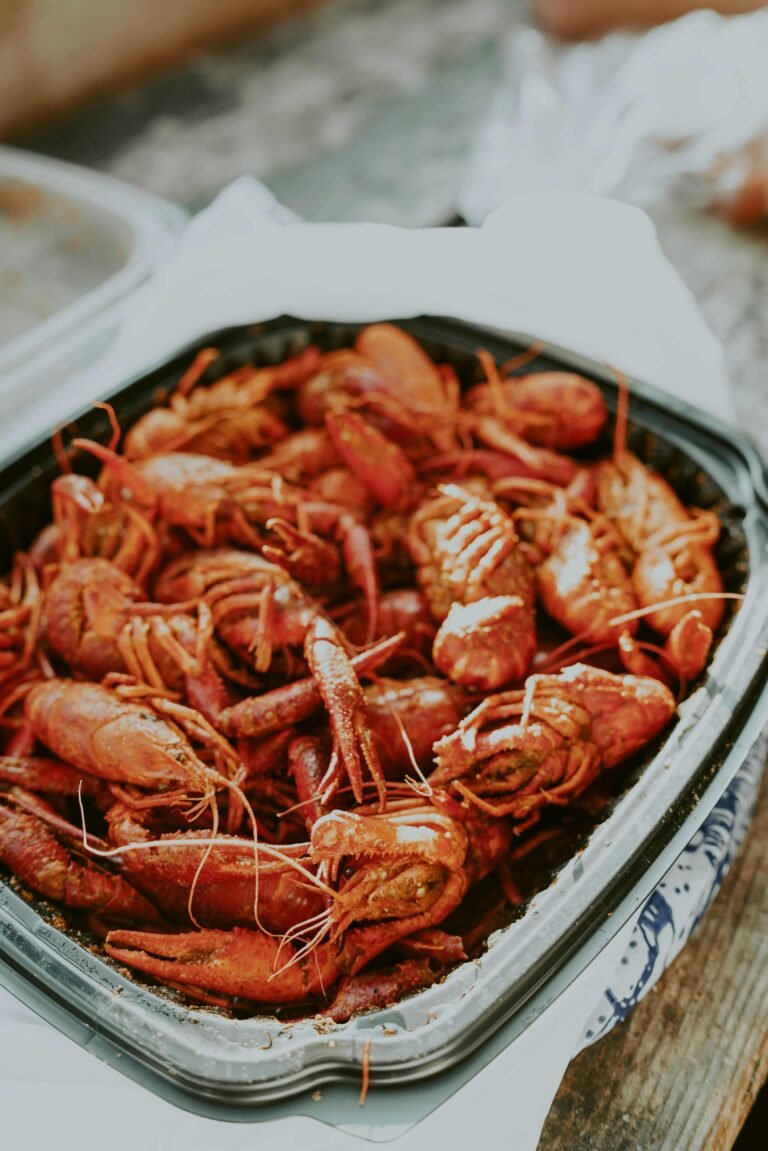 Mouth-watering cooked crawfish platter perfect for seafood lovers. Ideal for culinary presentations.